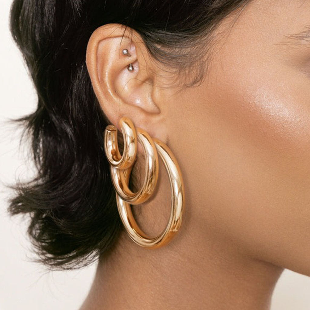 model in ettika earrings