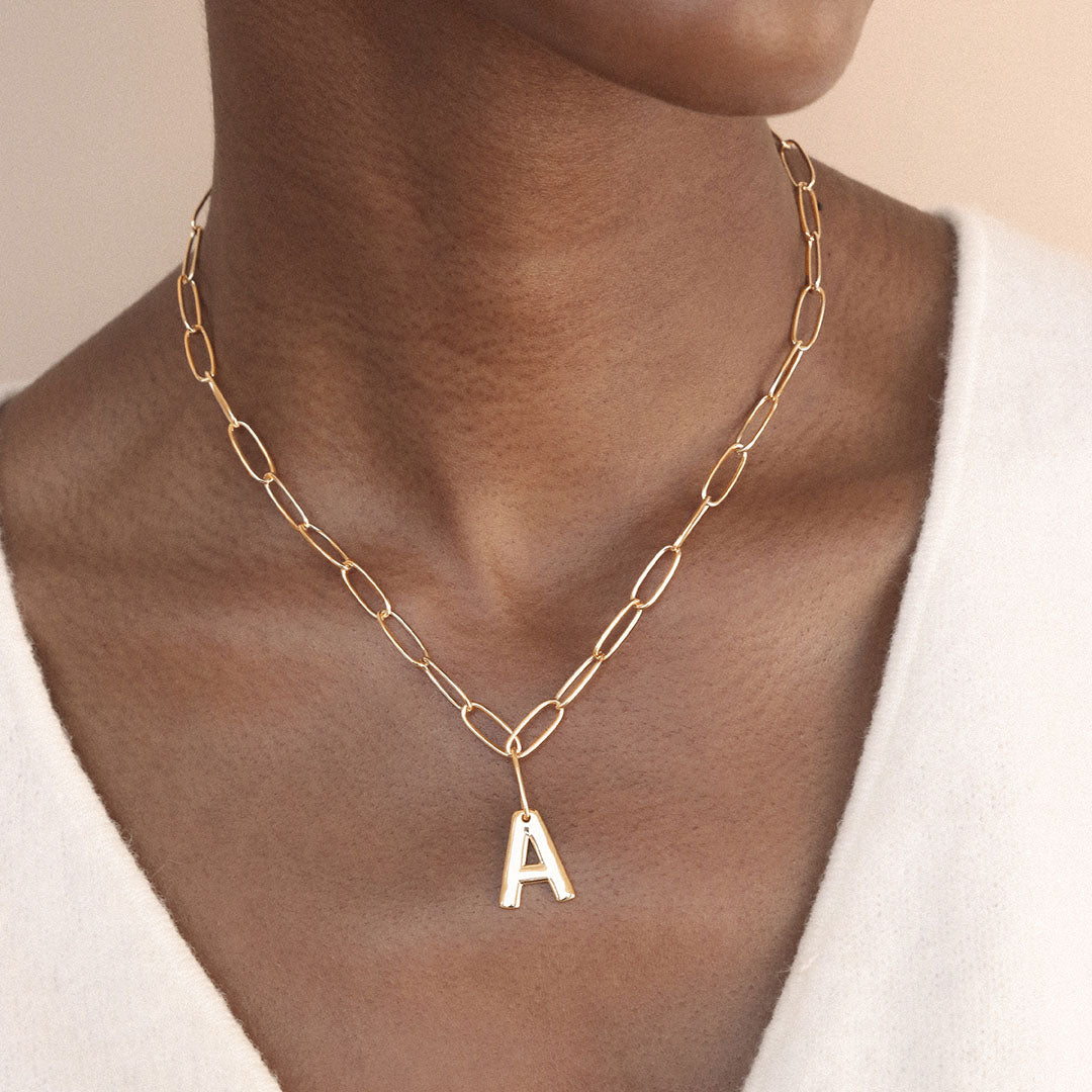 model in initial necklace