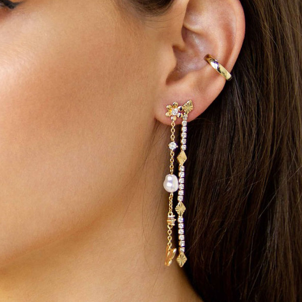 model in dangle earrings on sale