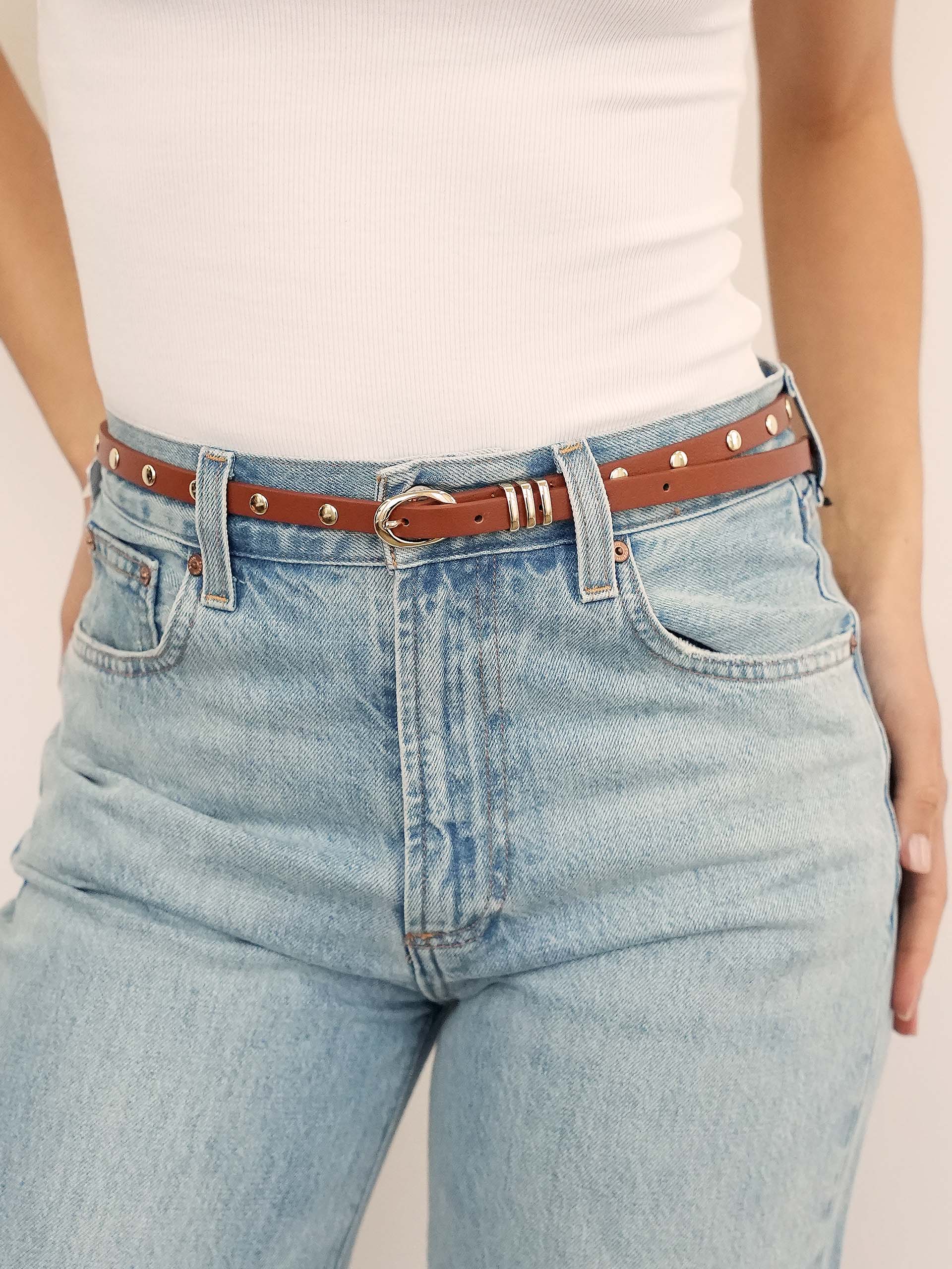 Classic Studded Skinny Belt in Cognac on model