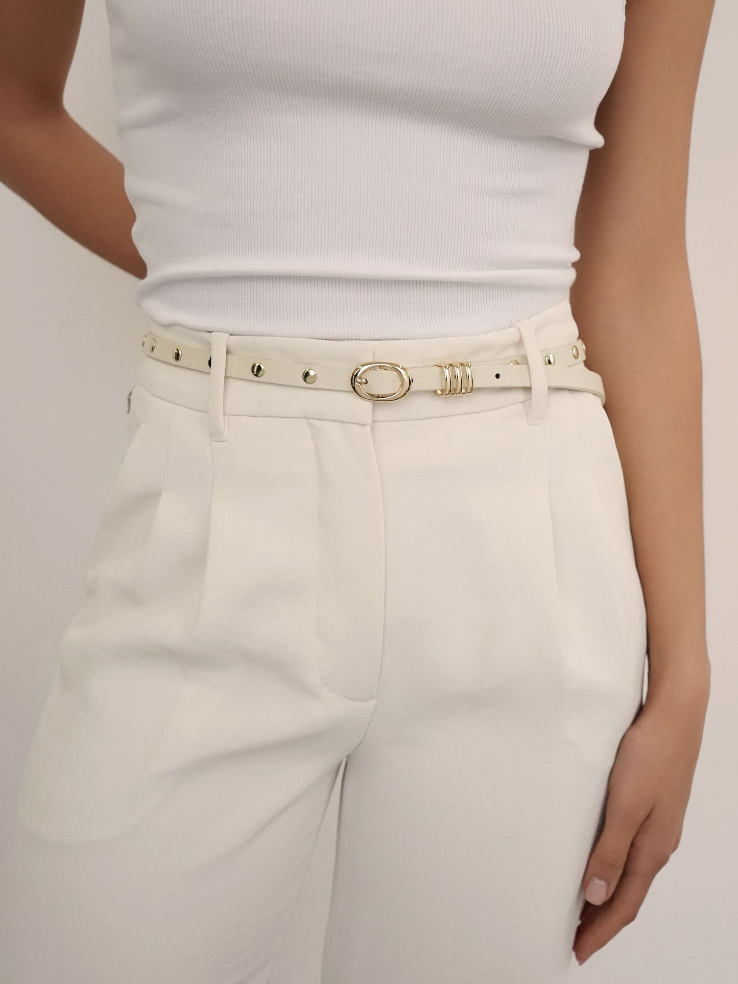 Classic Studded Skinny Belt in Vanilla on model 2