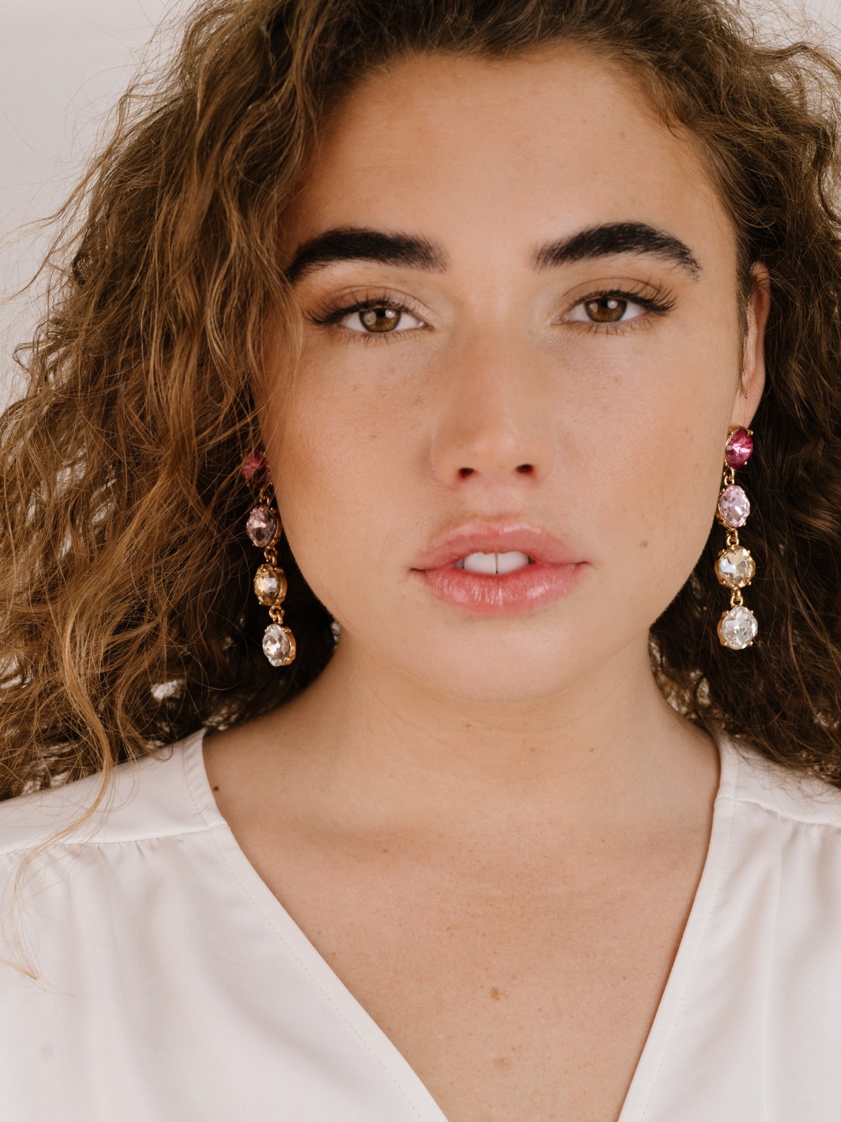 Four the Money Earrings on model 5