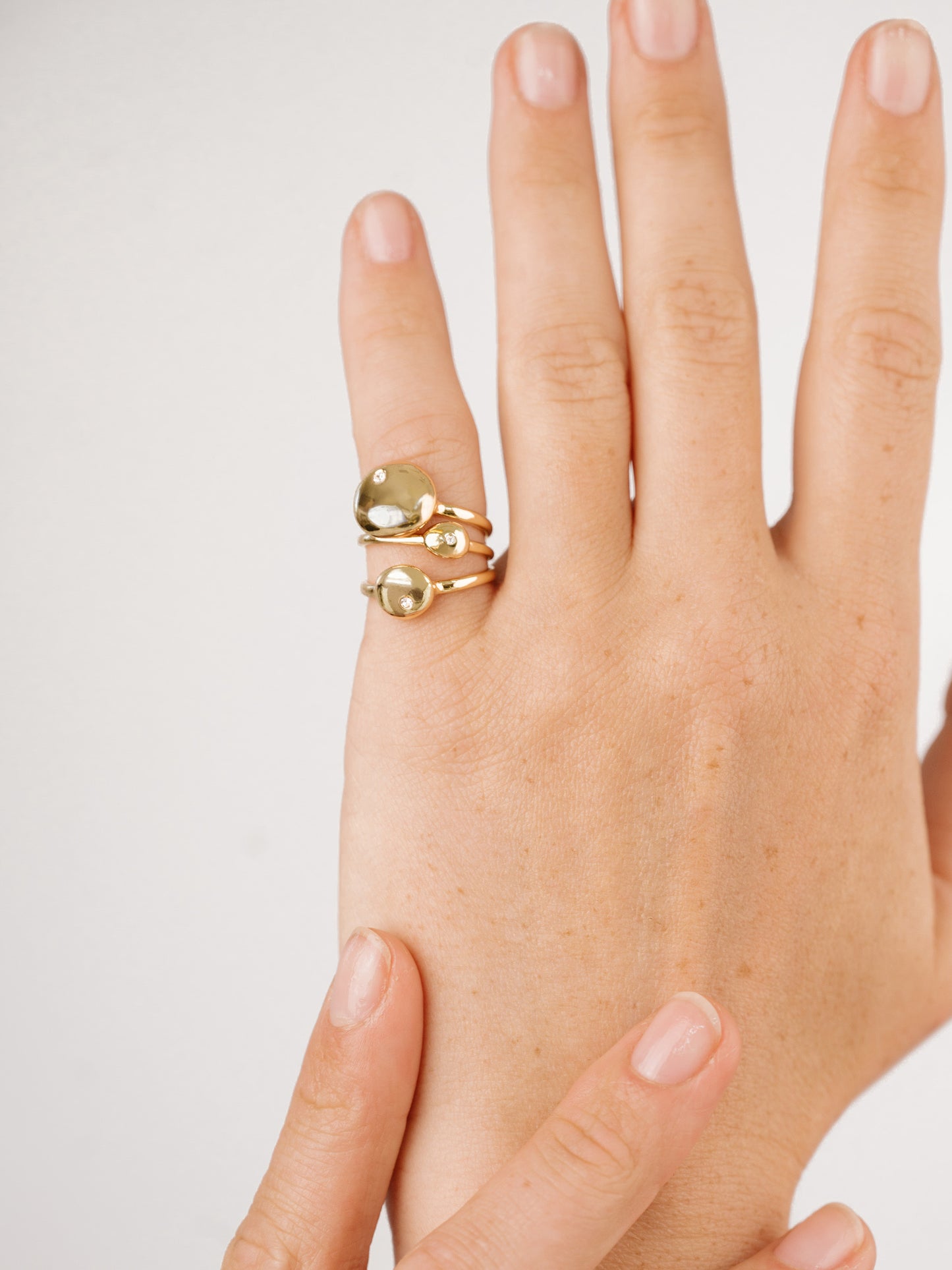 Polished Stacking Pebble Ring Set on model