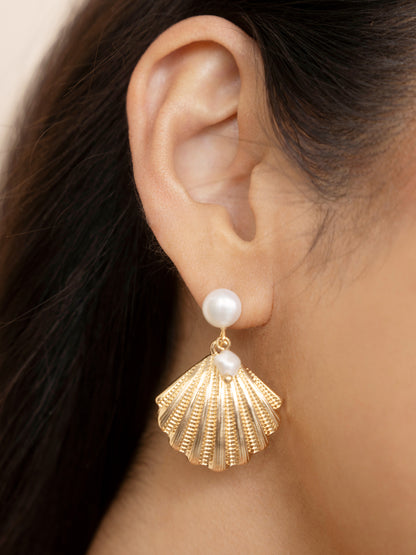 Scallop Shell and Pearl Earrings on model