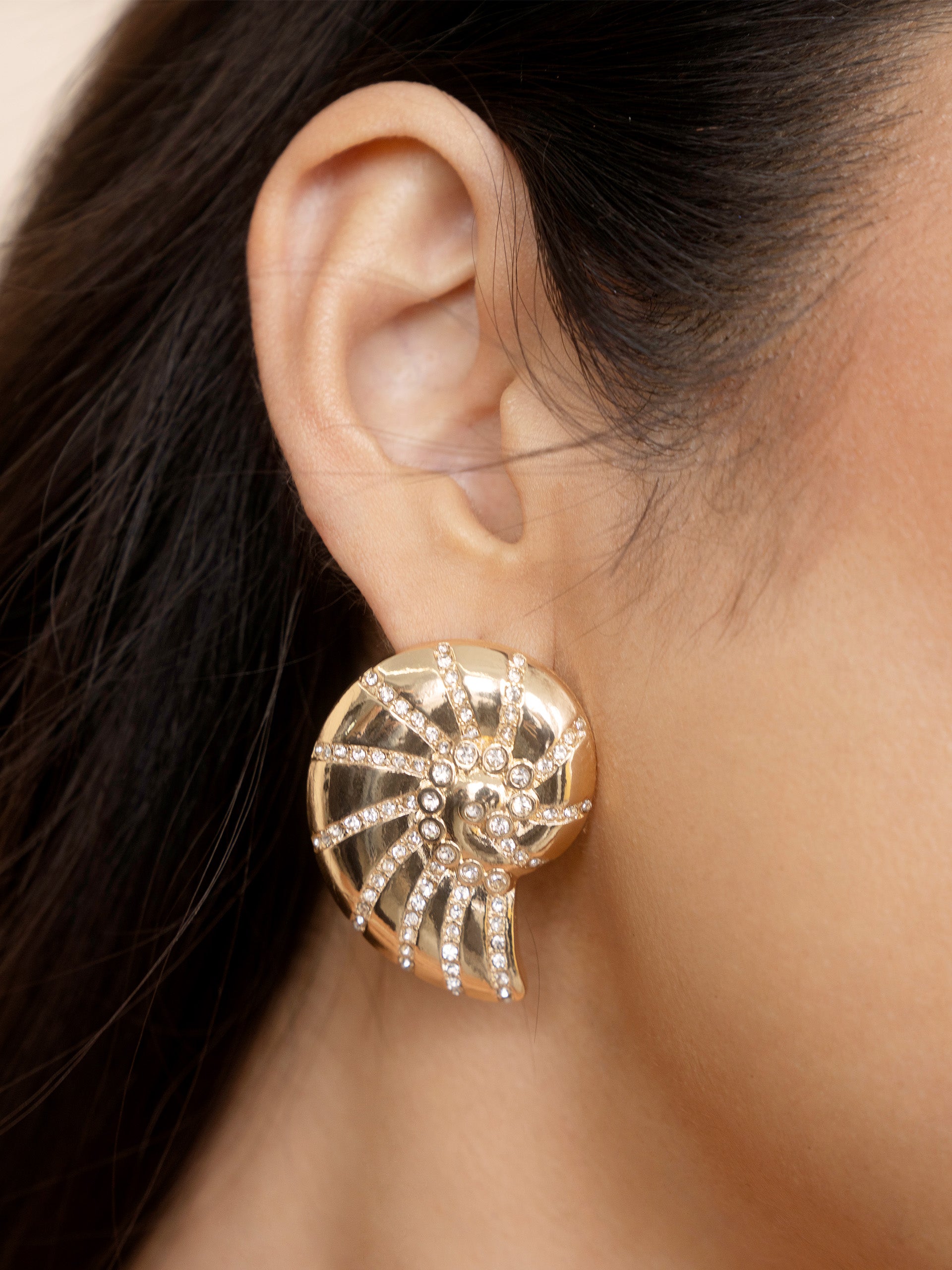 Crystal Studded Nautilus Shell Earrings on model