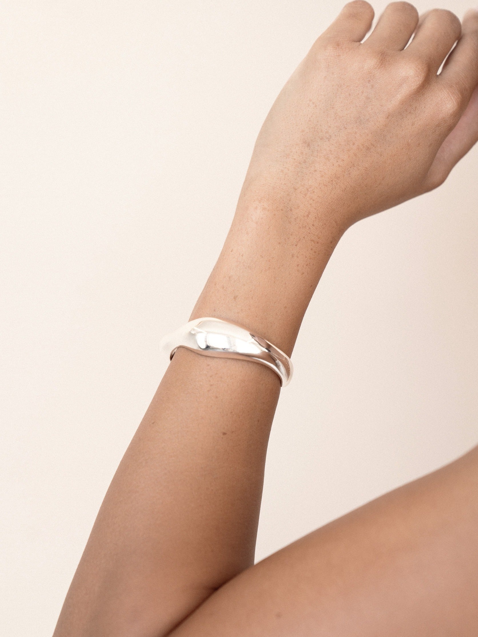 Liquid Love Cuff in silver on model