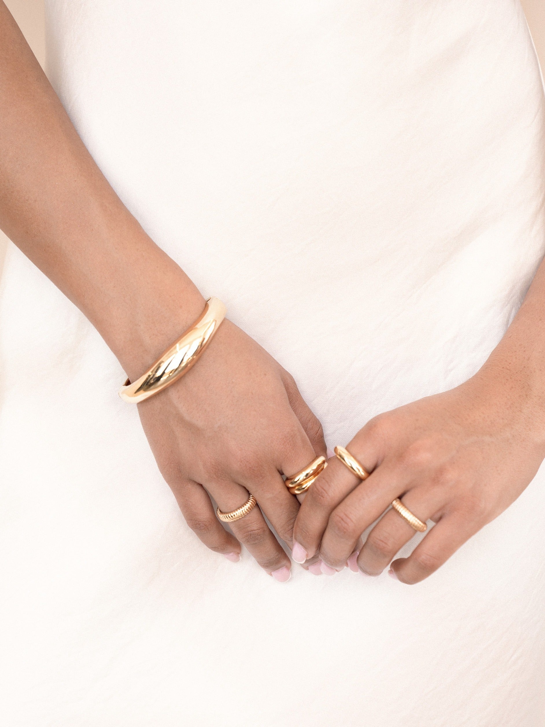 Liquid Love Cuff in gold on model