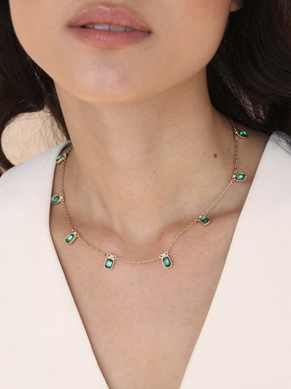 Emerald Deco Charm Necklace on model 3