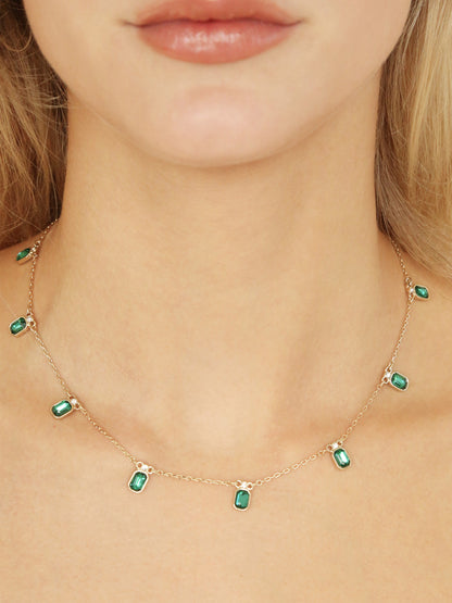 Emerald Deco Charm Necklace on model