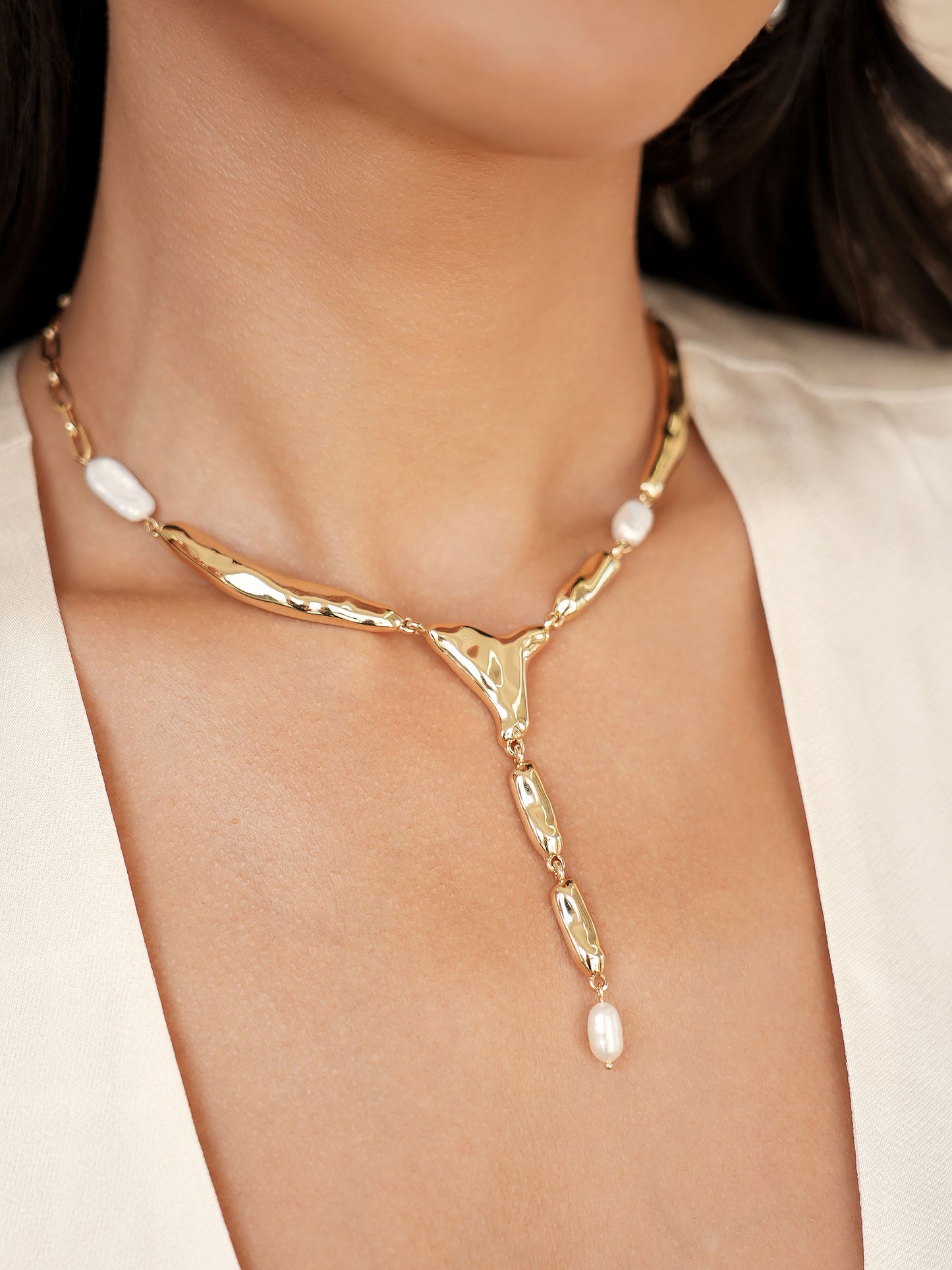 Liquid Melt and Pearl Lariat on model