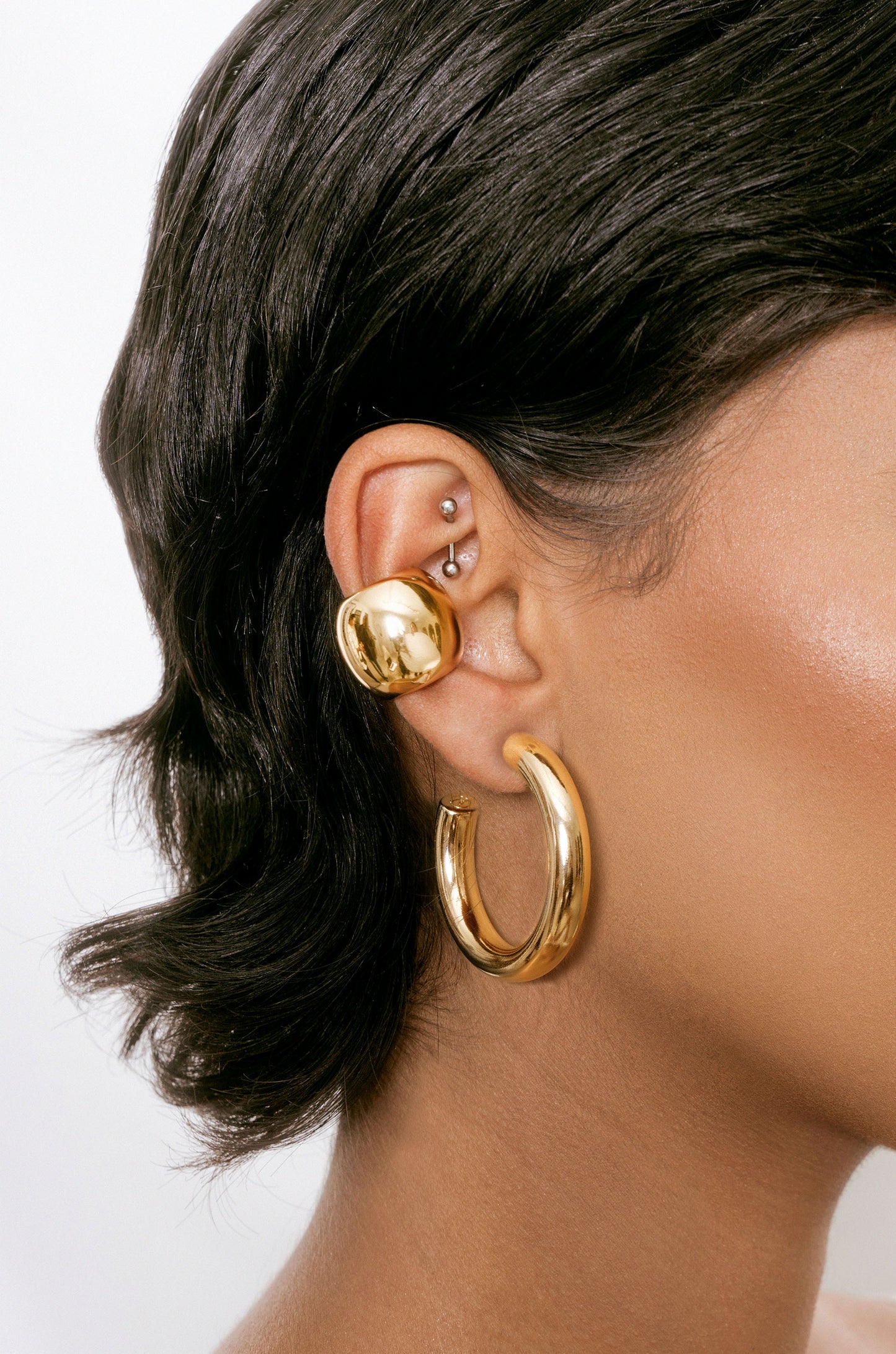 Thick Medium Hoops (1.5") and Chunky Cuff Set 2 on modelThick Medium Hoops (1.5") and Chunky Cuff Set