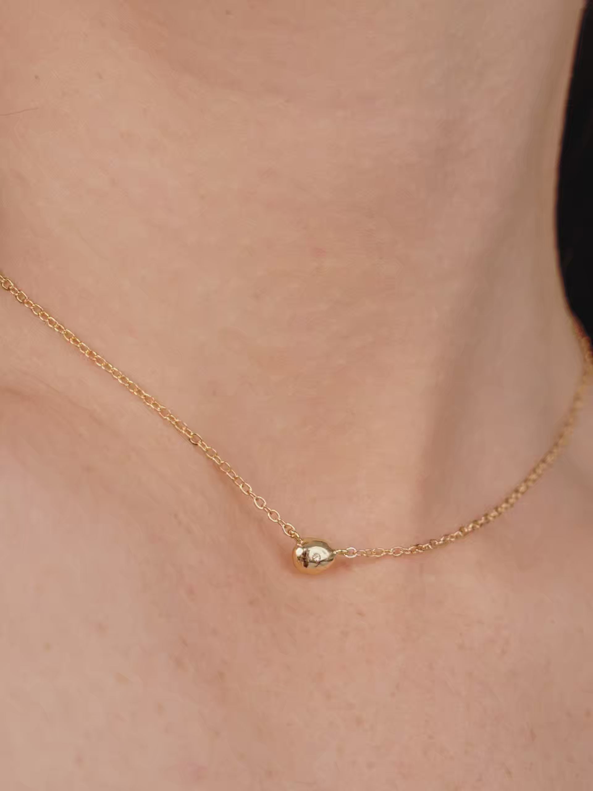 Polished Dainty Pebble Necklace video