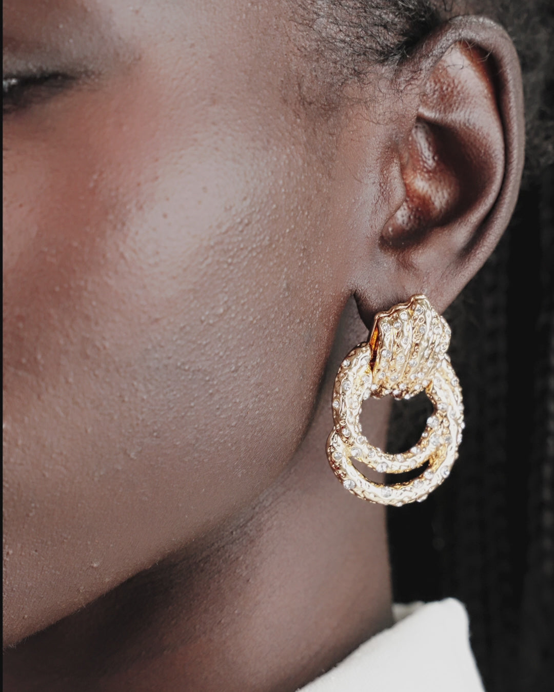 Only Royalty Crystal Earrings on model in video