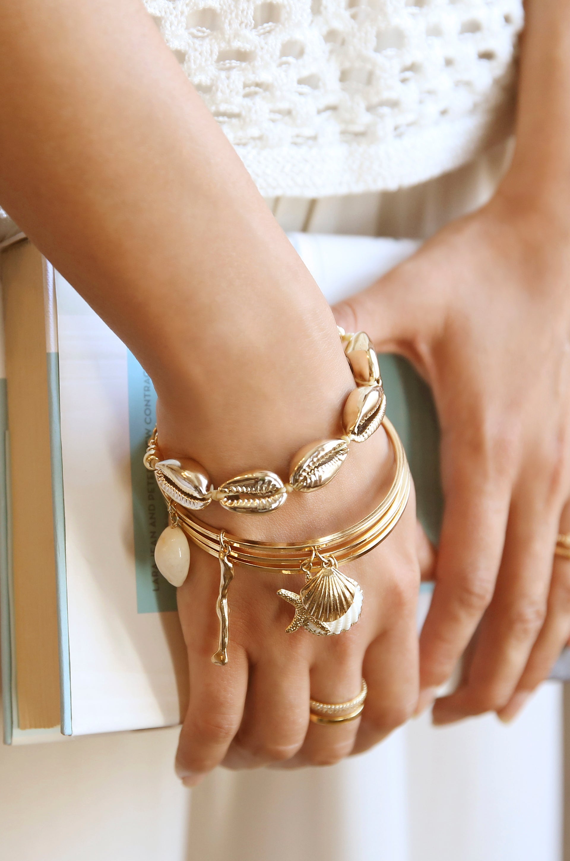 Beach Life 18k Gold Plated Bangle Set shown on a model  